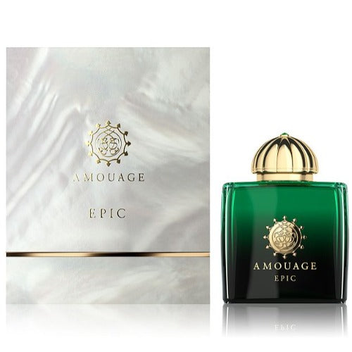 Amouage Epic fragrance bottle in deep green glass with gold dome cap, displayed with white marble-textured box packaging.