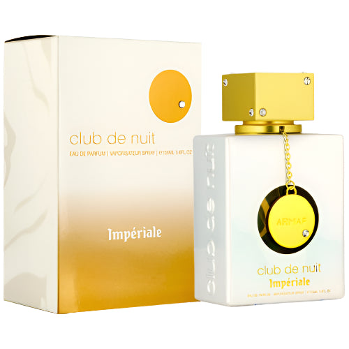 Armaf Club De Nuit Imperiale perfume bottle with gold cap and yellow pendant, displayed with cream and gold gradient box packaging