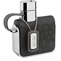 Armaf Tag Him cologne bottle with black quilted leather case and chain tag