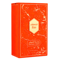 Armaf Eter red and gold fragrance box with hexagonal logo label and Arabic text