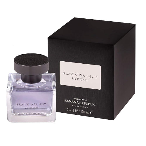 Banana Republic Black Walnut Legend perfume bottle with black cap next to black box packaging.
