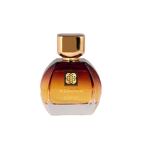 Admira Glamour amber gradient perfume bottle with gold cap and square emblem label