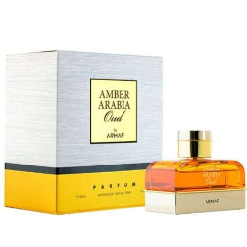 Armaf Amber Oud Arabia perfume bottle with gold cap next to retail box packaging