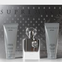 Afnan Supremacy Silver three-piece gift set with cologne bottle and two gray tubes on patterned box.