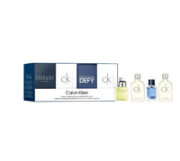 Calvin Klein men's fragrance mini set with Eternity, CK One, and Defy bottles with packaging box front view