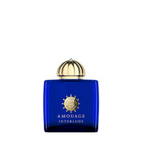 Amouage Interlude bottle with blue glass and gold dome cap