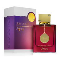 Armaf Club De Nuit Untold eau de parfum bottle in red with gold cap beside purple box packaging
