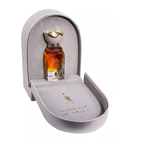 Ahmed Al Maghribi Zumar amber fragrance in gold-capped bottle displayed in white presentation case