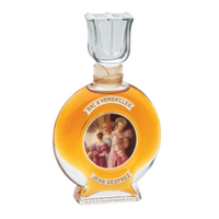 Bal A Versailles Eau De Toilette bottle with amber liquid, glass stopper, and classical portrait medallion on label.