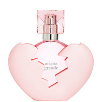 Ariana Grande Thank U Next pink heart-shaped perfume bottle with square cap and red stitching detail