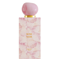 Ahmed Al Maghribi Rose Noir hair mist bottle displayed against pink petal pattern background