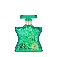 Bond No. 9 New York Musk green glass bottle with gold lettering and matching stopper
