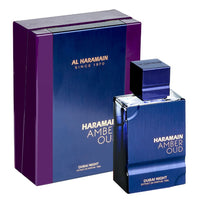 Al Haramain Amber Oud Dubai Night perfume bottle with purple gift box packaging