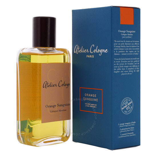 Atelier Cologne Orange Sanguine cologne bottle with dark cap next to blue and orange box packaging