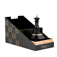 Armaf Checkmate King fragrance bottle in black with gold accents, displayed in branded black box packaging with chess piece pattern.