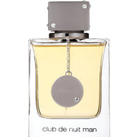 Armaf Club De Nuit eau de toilette bottle with pale yellow liquid and gray cap with dangling sphere charm