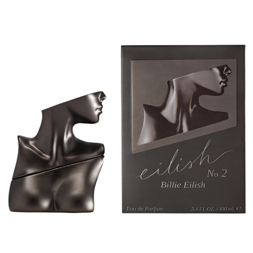 Billie Eilish No.2 Eau De Parfum bottle and box, dark metallic finish with sculptural silhouette design.