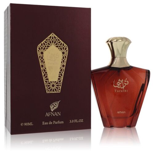 Afnan Turathi Brown perfume bottle with burgundy box and gold coffin-shaped emblem