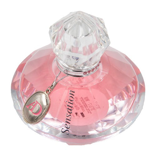 Pink Eau de Parfum bottle with crystal stopper and silver heart charm pendant