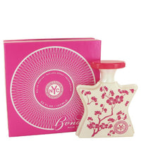 Bond No. 9 Chinatown perfume bottle with pink box featuring floral design and circular logo pattern