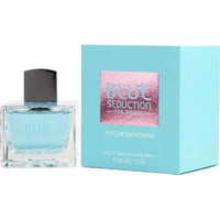 Blue Seduction perfume bottle with light blue box and product packaging displayed together