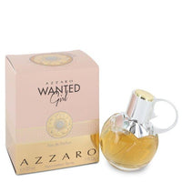Azzaro Wanted Girl perfume bottle with pink box and gold accents