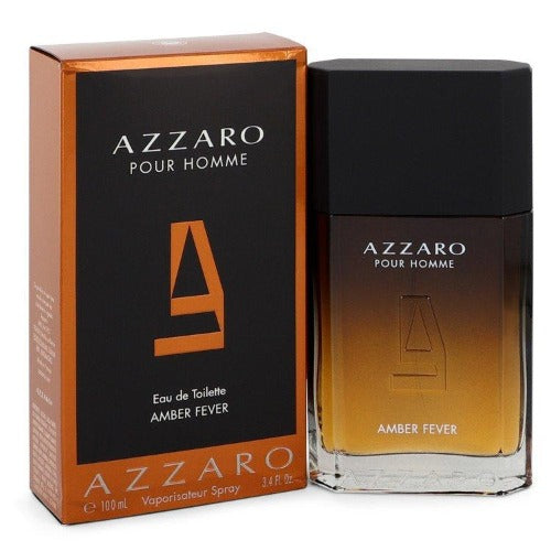 Azzaro Pour Homme Amber Fever fragrance bottle with orange and black packaging box displayed beside it.
