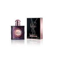 Black Opium Nuit Blanche perfume bottle with glitter finish and matching box packaging