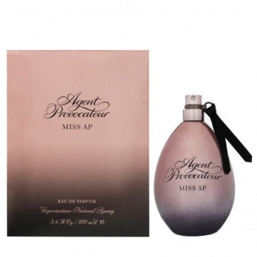 Agent Provocateur Miss AP perfume bottle and box in pink and gray gradient packaging