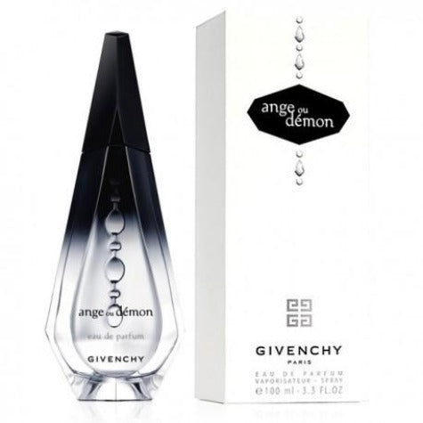 Ange Ou Demon eau de parfum bottle with gradient black to clear glass, white box, and hanging charm tag.