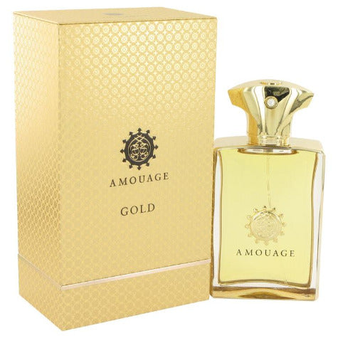 Amouage Gold perfume bottle next to its gold patterned box packaging