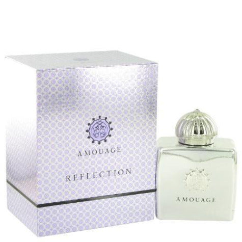 Amouage Reflection perfume bottle with lavender patterned box packaging displayed together.