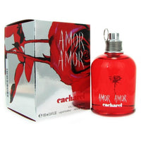 Amor Amor red eau de toilette bottle with decorative box packaging featuring floral design