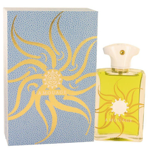 Amouage Sunshine Eau De Parfum bottle with yellow liquid next to blue and gold sun-patterned box