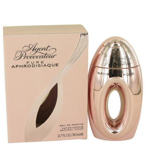 Agent Provacateur Pure Aphrodisiaque fragrance bottle with box, rose gold oval shaped bottle with spray atomizer next to beige packaging.