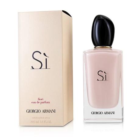 Armani Si Fiori eau de parfum bottle with black cap next to cream-colored box