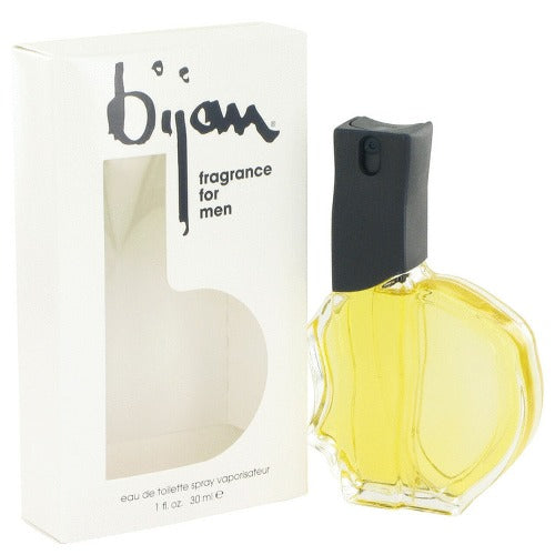 Bijan fragrance bottle with yellow liquid beside cream-colored box with black cap