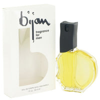Bijan fragrance bottle with yellow liquid beside cream-colored box with black cap