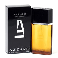 Azzaro Pour Homme cologne bottle with black cap next to black box packaging, 200ml size.