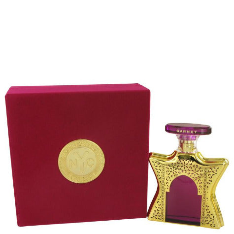 Bond No. 9 Dubai Garnet perfume bottle with burgundy box and gold packaging
