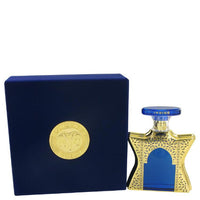 Bond No. 9 Dubai Indigo fragrance bottle with navy box and gold coin emblem