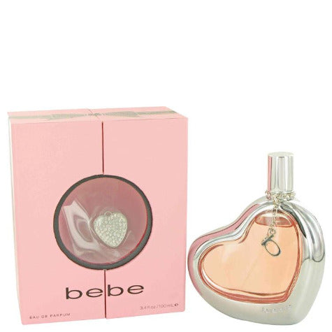 Bebe Eau De Parfum heart-shaped bottle with pink packaging box displaying product details