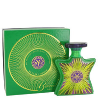 Bond No. 9 Bleecker St green bottle with yellow starburst design and matching box
