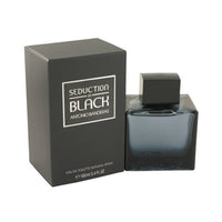 Black Seduction Eau De Toilette bottle with dark gray box packaging displayed together