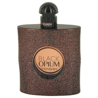 Black Opium Eau De Toilette bottle by Yves Saint Laurent with bronze textured packaging and dome cap.