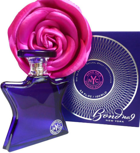 Bond No. 9 Spring Fling perfume bottle in blue with pink rose cap and navy box packaging.