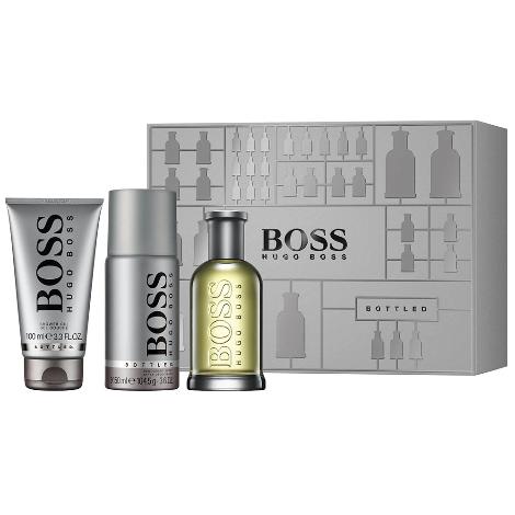 Boss Bottled three-piece gift set with cologne, deodorant spray, and shower gel in gray packaging box.