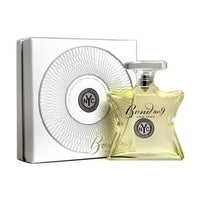 Bond No. 9 Chez perfume bottle in yellow-gold liquid with white circular packaging box.
