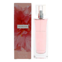Banana Republic Wildbloom fragrance bottle next to red floral box packaging