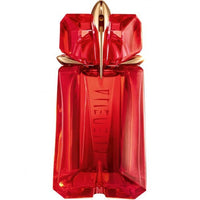 Red crystal fragrance bottle with gold cap and bow detail